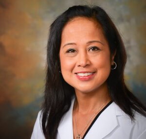 Headshot of Dr. Christina Medrano, a board-certified physician specializing in Family Medicine at the Center for Living Well - Celebration
